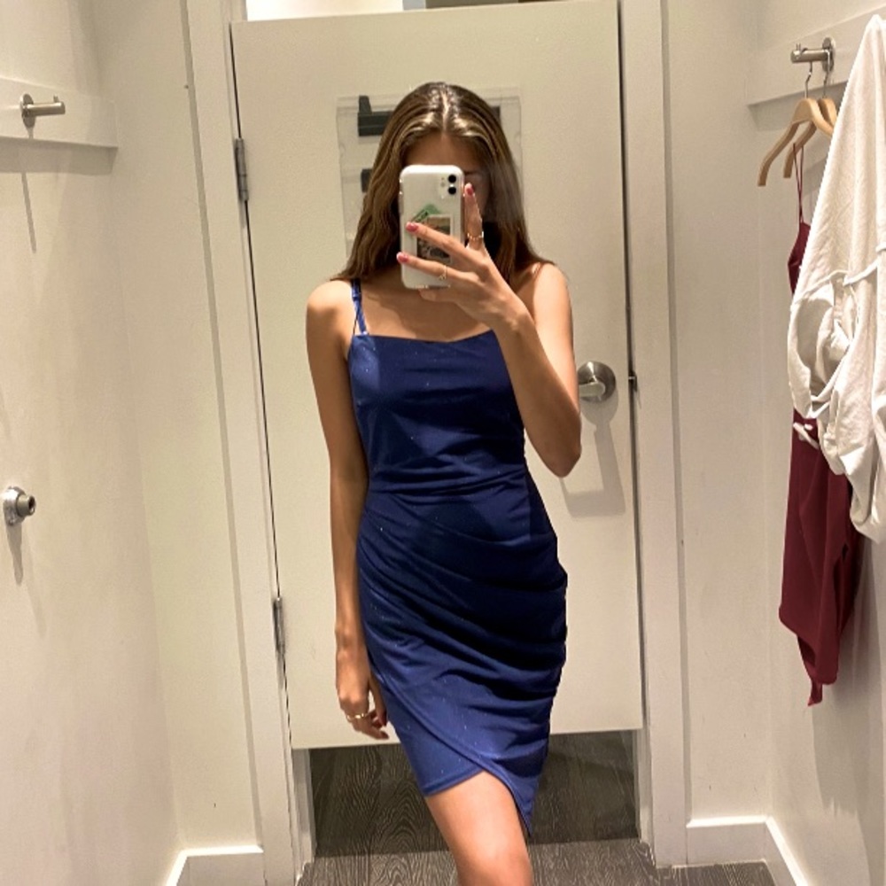 In between fancy and casual,  blue dress
